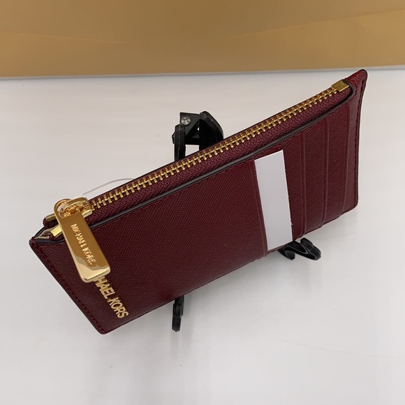 Michael Kors Jet Set Travel Medium Top Zip Card
Case Wallet
Dark Sherry color - Picture 5 of 11